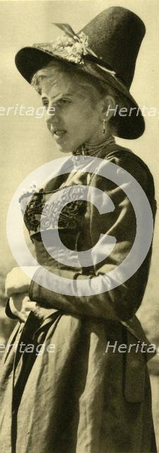 Woman in traditional costume, Tyrol, Austria, c1935.  Creator: Unknown.