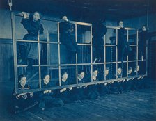 Female students posing with exercise equipment in a gymnasium, Western..., Washington DC, (1899?). Creator: Frances Benjamin Johnston.