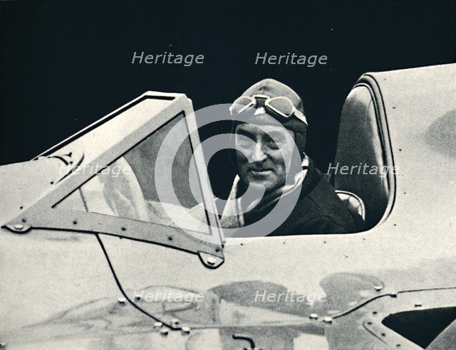 ''Sir Malcolm Campbell at the wheel of Bluebird', 1937. Artist: Unknown.
