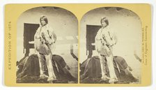 Shee-zah-nan-tan, Jicarilla Apache Brave in characteristic Costume, Northern New Mexico, 1874. Creator: Tim O'Sullivan.