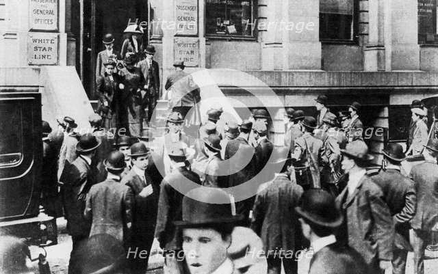 Anxious crowds outside the White Star Line office, 1912 (1937). Artist: Sport & General