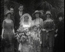 Family Gathering for Photographs at the Wedding of Beatrice Lillie and Sir Robert Peel..., 1920. Creator: British Pathe Ltd.