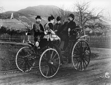 Karl Benz with his wife Bertha in a Benz-Viktoria, 1893. Artist: Unknown