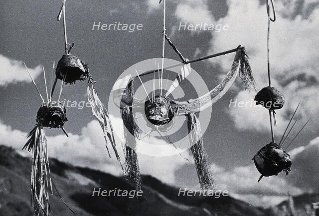 Kalyo Kengyu, northern India: human heads hung up as trophies in a Naga village, c1930s. Creator: Unknown.