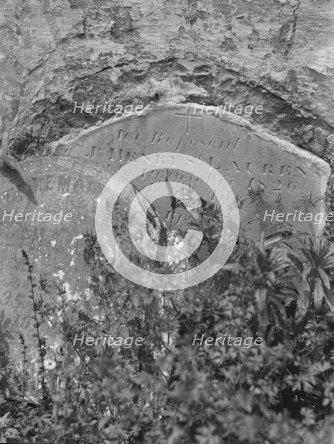 Wall tomb in the St. Louis Cemetery, New Orleans, between 1920 and 1926. Creator: Arnold Genthe.