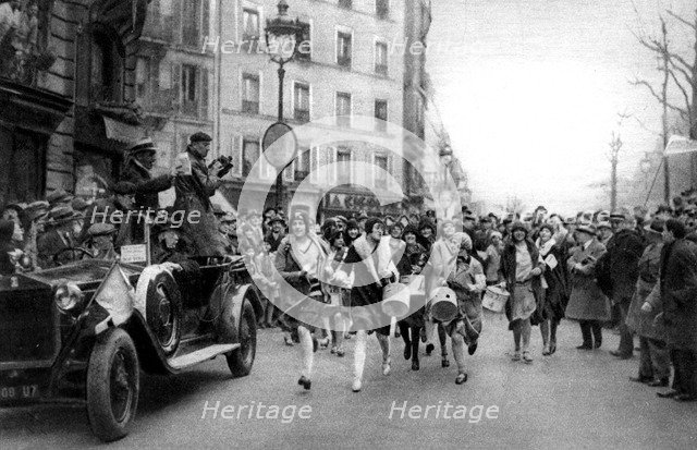 Walking match of midinettes, Paris, St Catherine's Day, 1931.Artist: Ernest Flammarion