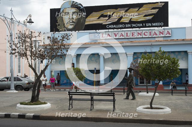 Sign 'advertising' the bravery of Che Guevara overlooking the pedestrian area, Cienfuegos, Cuba,2024 Creator: Ethel Davies.