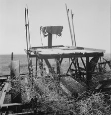 Possibly: Farm machinery left on abandoned dry land farm in Columbian Basin, Washington, 1939. Creator: Dorothea Lange.