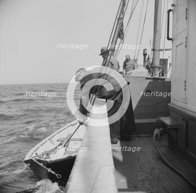 On board the fishing boat Alden, out of Gloucester, Massachusetts, 1943. Creator: Gordon Parks.