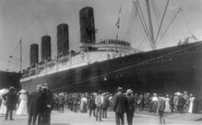 LUSITANIA arriving in N.Y. for first time, Sept. 13, 1907: starboard view; crowd at dock..., 1907. Creator: Frances Benjamin Johnston.