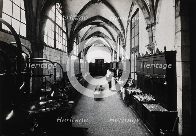 Hospital de la Santa Cruz, Barcelona: the interior of the pharmacy. Creator: Unknown.
