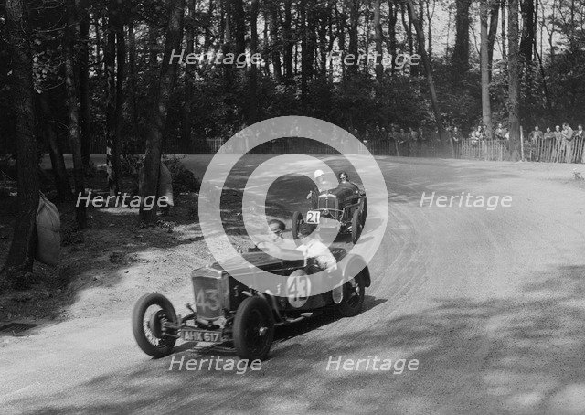 Frazer-Nash TT replica leading a Wolseley Hornet at Donington Park, Leicestershire, 1930s. Artist: Bill Brunell.