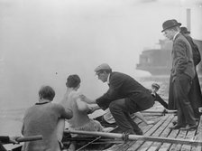 Rice, coach of Columbia Varsity crew team instructing, 1910. Creator: Bain News Service.
