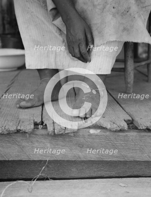 Fifty-seven year old sharecropper woman, Hinds County, Mississippi, 1937. Creator: Dorothea Lange.