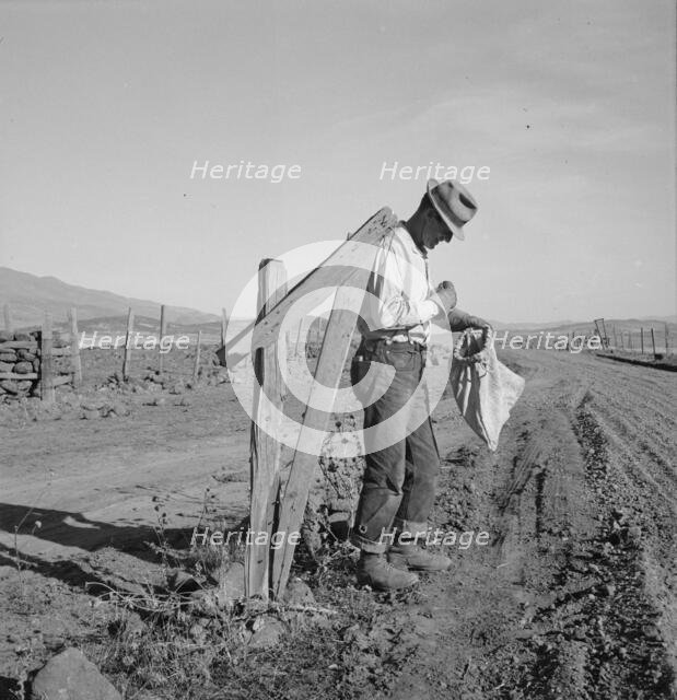 Farmer getting the morning mail, Gem County, Idaho, 1939. Creator: Dorothea Lange.