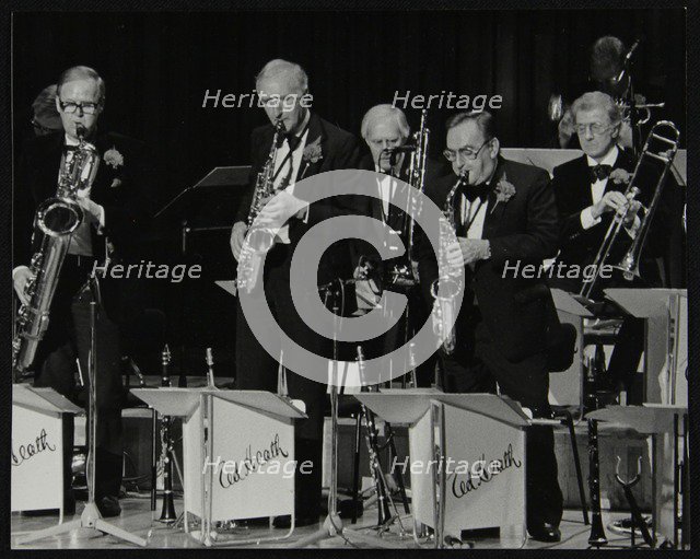 The Ted Heath Orchestra in concert at the Barbican Hall, London, 5 December 1985. Ronnie Chamberlain Artist: Denis Williams