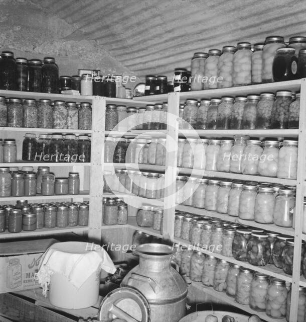 Interior of Mrs. Botner's storage cellar, Nyssa Heights, Malheur County, Oregon, 1939. Creator: Dorothea Lange.