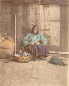 [Chinese Woman Sitting with Basket], 1870s. Creator: Baron Raimund von Stillfried.