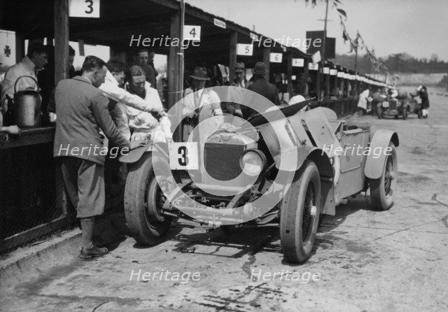 Dudley Froy with the 4.5 litre Invicta S type, at Brooklands, Surrey, 1931. Artist: Unknown