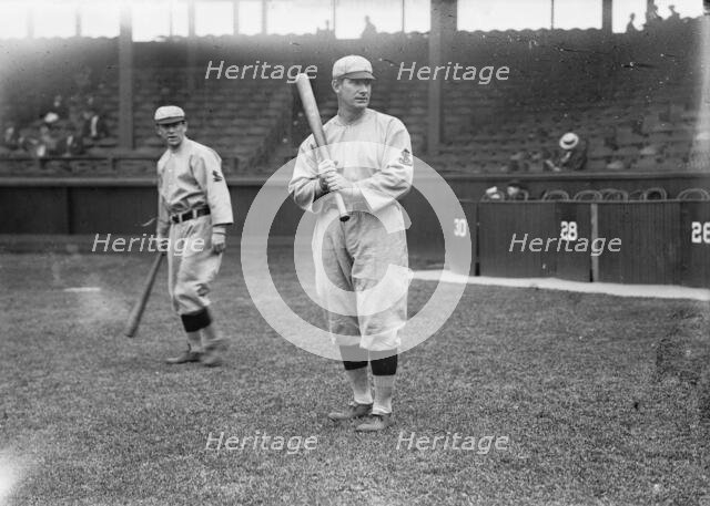 Roger Bresnahan, St. Louis, NL, Miller Huggins in background (baseball), c1911. Creator: Bain News Service.