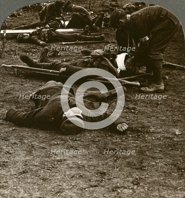 After the storm and stress of battle, caring for the wounded, World War I, 1914-1918.Artist: Realistic Travels Publishers