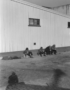 On the sun side of the shed, Transient men, San Francisco, California, 1936. Creator: Dorothea Lange.