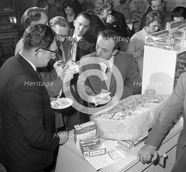 Sampling chicken patties, Wilsic, near Doncaster, South Yorkshire, 1961. Artist: Michael Walters