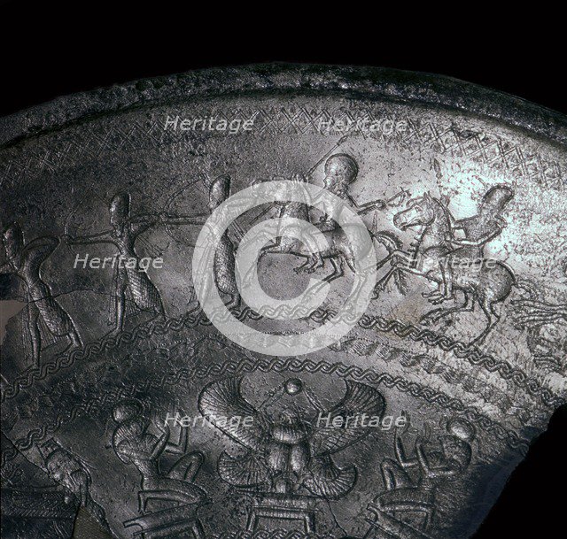 Detail of a Phoenician silver bowl showing soldiers attacking a city, 7th century BC. Artist: Unknown