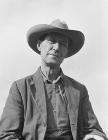 Farmer from Nebraska now developing eighty-acre stump farm, Bonner County, Idaho, 1939. Creator: Dorothea Lange.