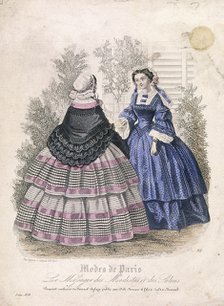 Two women wearing the latest fashions in a garden setting, 1858. Artist: Anon