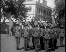 Soldiers Carrying Rifles Patrolling Outside the Egyptian Palace After the Assassination of..., 1924. Creator: British Pathe Ltd.