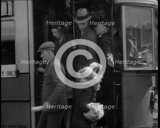 People Getting Off a Tram, 1936. Creator: British Pathe Ltd.