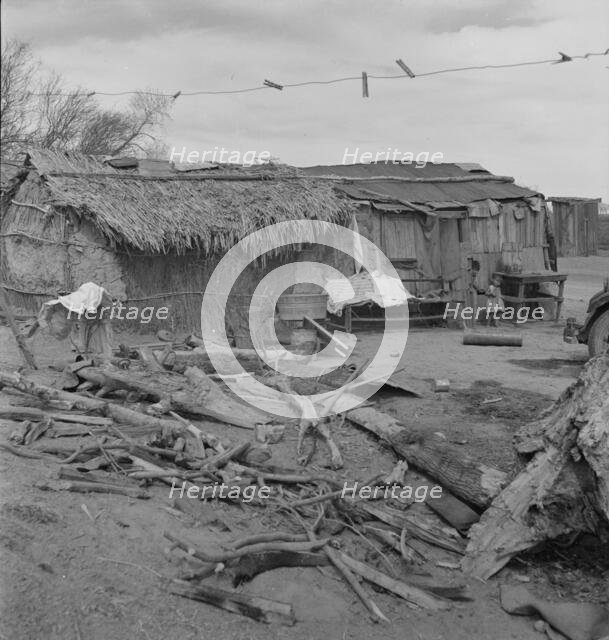 Ditch bank housing for Mexican field workers, Imperial Valley, California, 1937. Creator: Dorothea Lange.