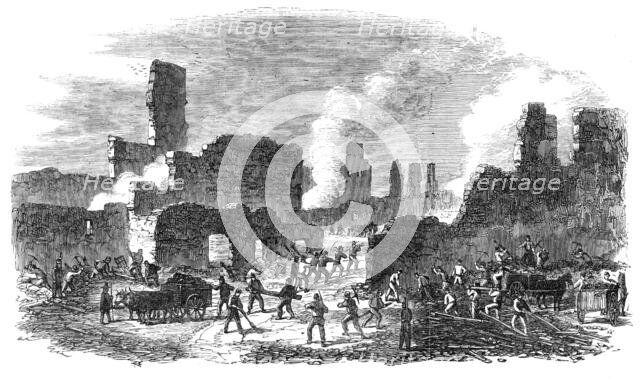 The Great Fire at Limoges, France: firemen and soldiers clearing out a portion of the ruins…, 1864. Creator: Unknown.