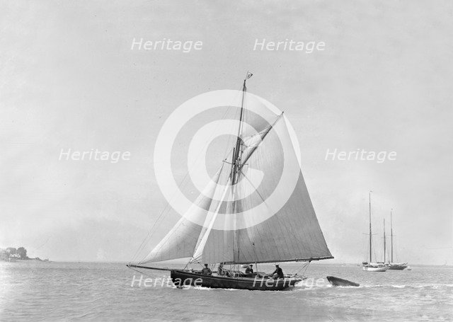 The 9 ton auxilary cutter 'Grayling', 1921. Creator: Kirk & Sons of Cowes.