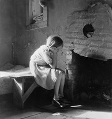Resettled farm child from Taos Junction to Bosque Farms project, New Mexico, 1935. Creator: Dorothea Lange.