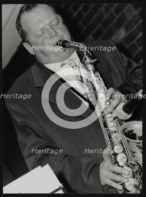 Alan Barnes (alto saxophone) playing at The Fairway, Welwyn Garden City, Hertforrdshire, 2002. Artist: Denis Williams