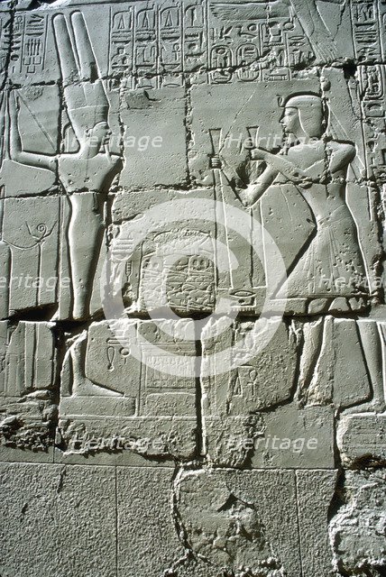 Relief of Rameses II offering to the fertility god Min, Temple of Amun, Karnak, Egypt. Artist: Unknown