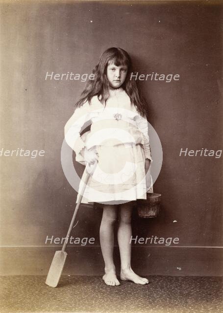 "Xie" Kitchin with Bucket and Spade, Taken in 1873. Creator: Lewis Carroll.