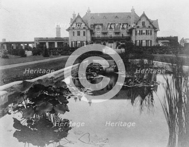 Facade of home of Edmund Cogswell Converse, with lily pond in..., Greenwich, Connecticut, 1908. Creator: Frances Benjamin Johnston.