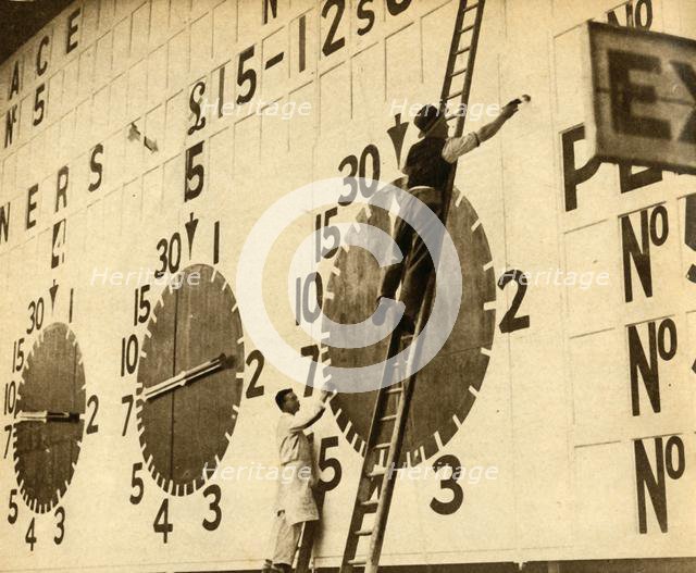 Painters at work on the White City tote, West London, 1932, (1933). Creator: Unknown.