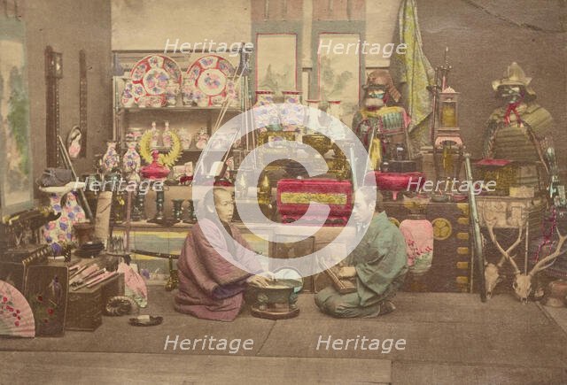 Two Japanese business men in their shop, 1868-1880. Creator: Felice Beato.