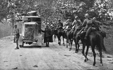 The Dark Hours of Italy; Armored car and cavalry protecting the retreat of a column.., 1917. Creator: Unknown.