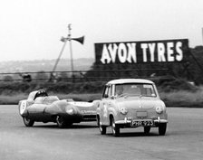 Goggomobil microcar competing in a 6 hour relay race at Silverstone, Northamptonshire, 1957. Creator: Unknown.