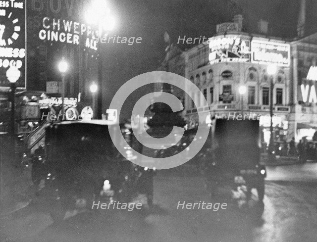 Piccadilly Circus at night, Westminster, London. Artist: Unknown