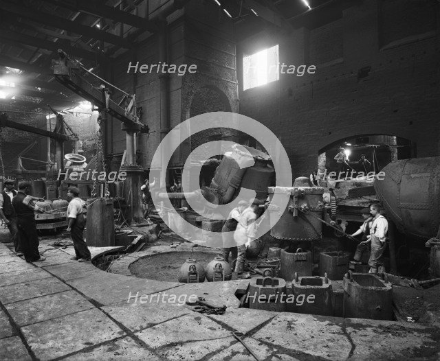 Steel production at the Cammell Laird works, Penistone, Yorkshire, 1913. Artist: H Bedford Lemere.