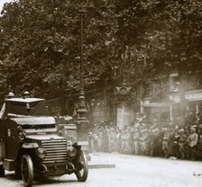 Machine gun mounted in armoured vehicle, victory parade, c1918. Artist: Unknown.