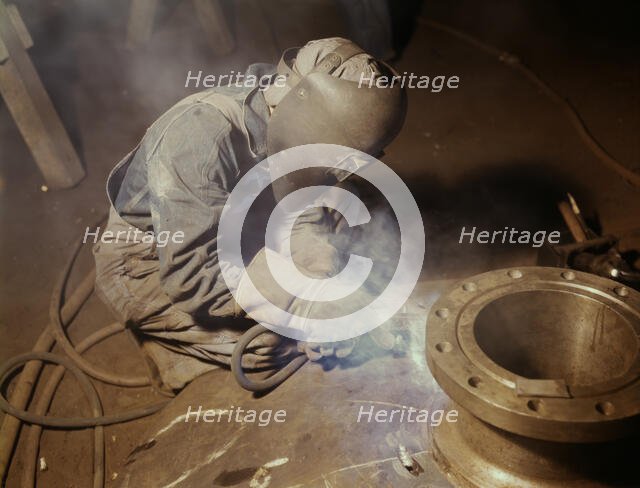 Welder making boilers for a ship, Combustion Engineering Co., Chattanooga, Tenn., 1942. Creator: Alfred T Palmer.