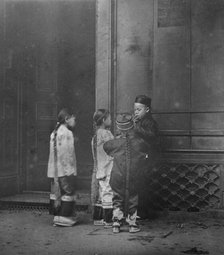His first cigar, Chinatown, San Francisco, between 1896 and 1906. Creator: Arnold Genthe.