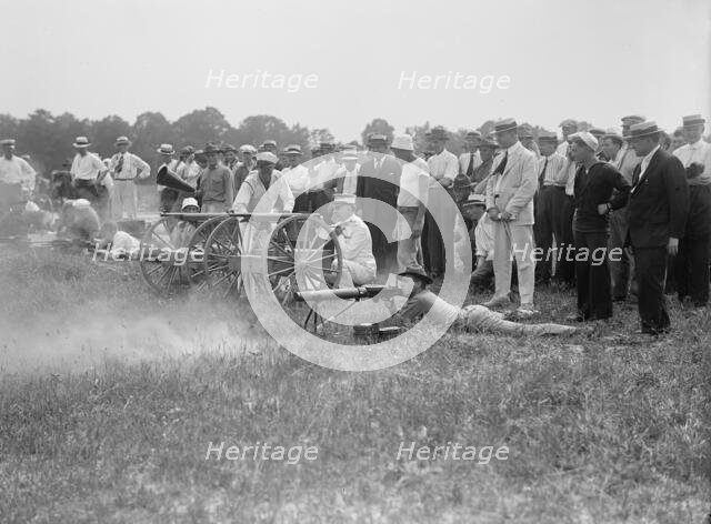 Marine Corps Rifle Range, Winthrop, Md. - Gen. Barnett Testing Colt's Automatic Machine Gun, 1917. Creator: Harris & Ewing.